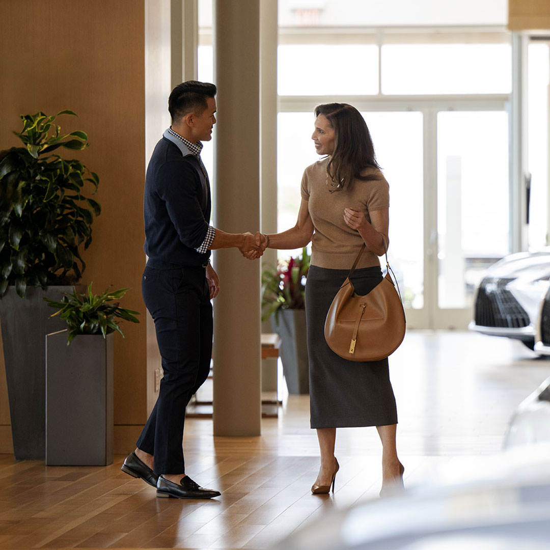 A Lexus Consultant greeting a guest
